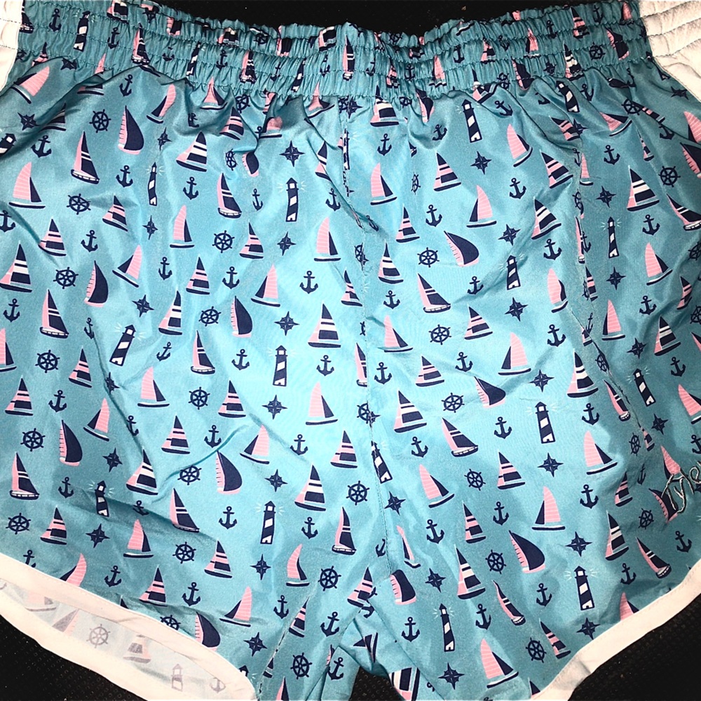 Blue shorts with anchors on them